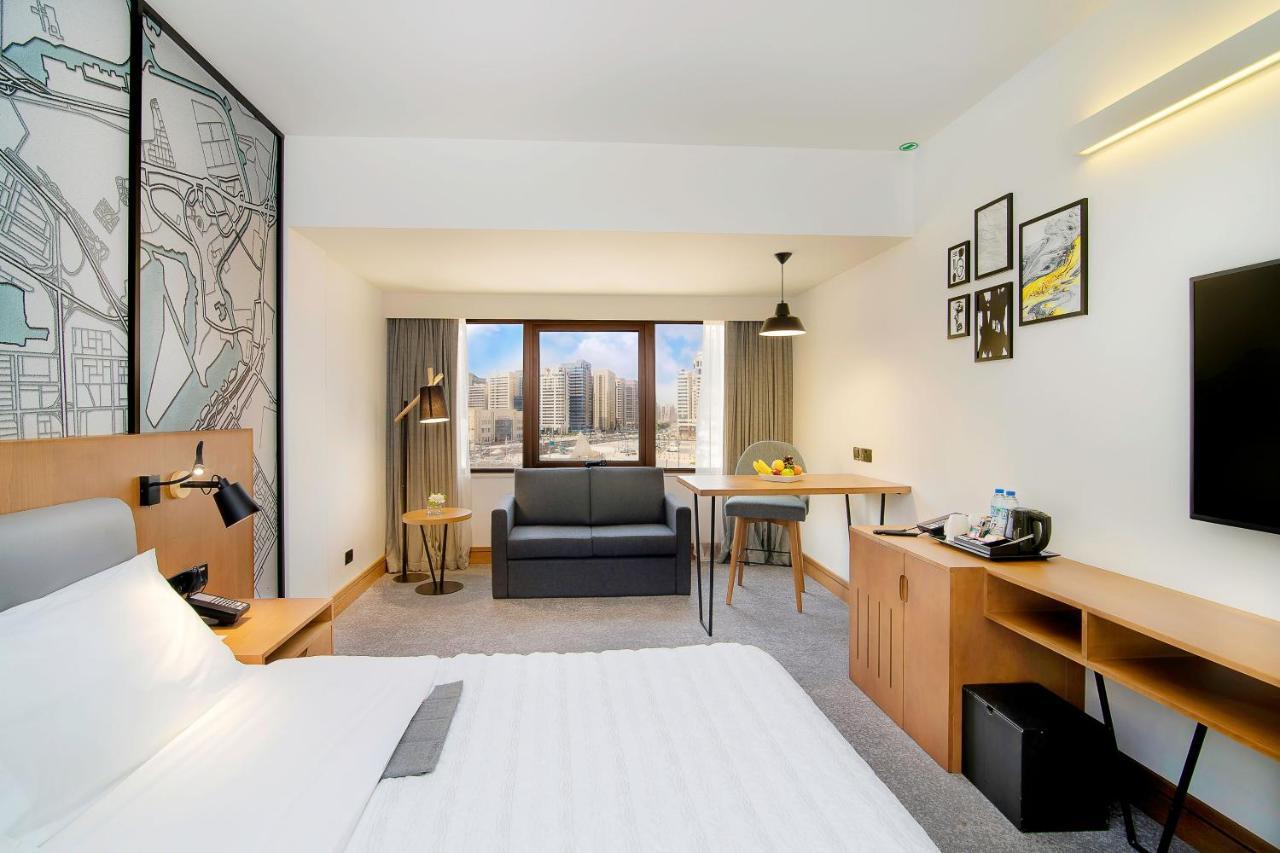 르 메르디앙 아부다비 호텔 외부 사진 A typical room at the hotel